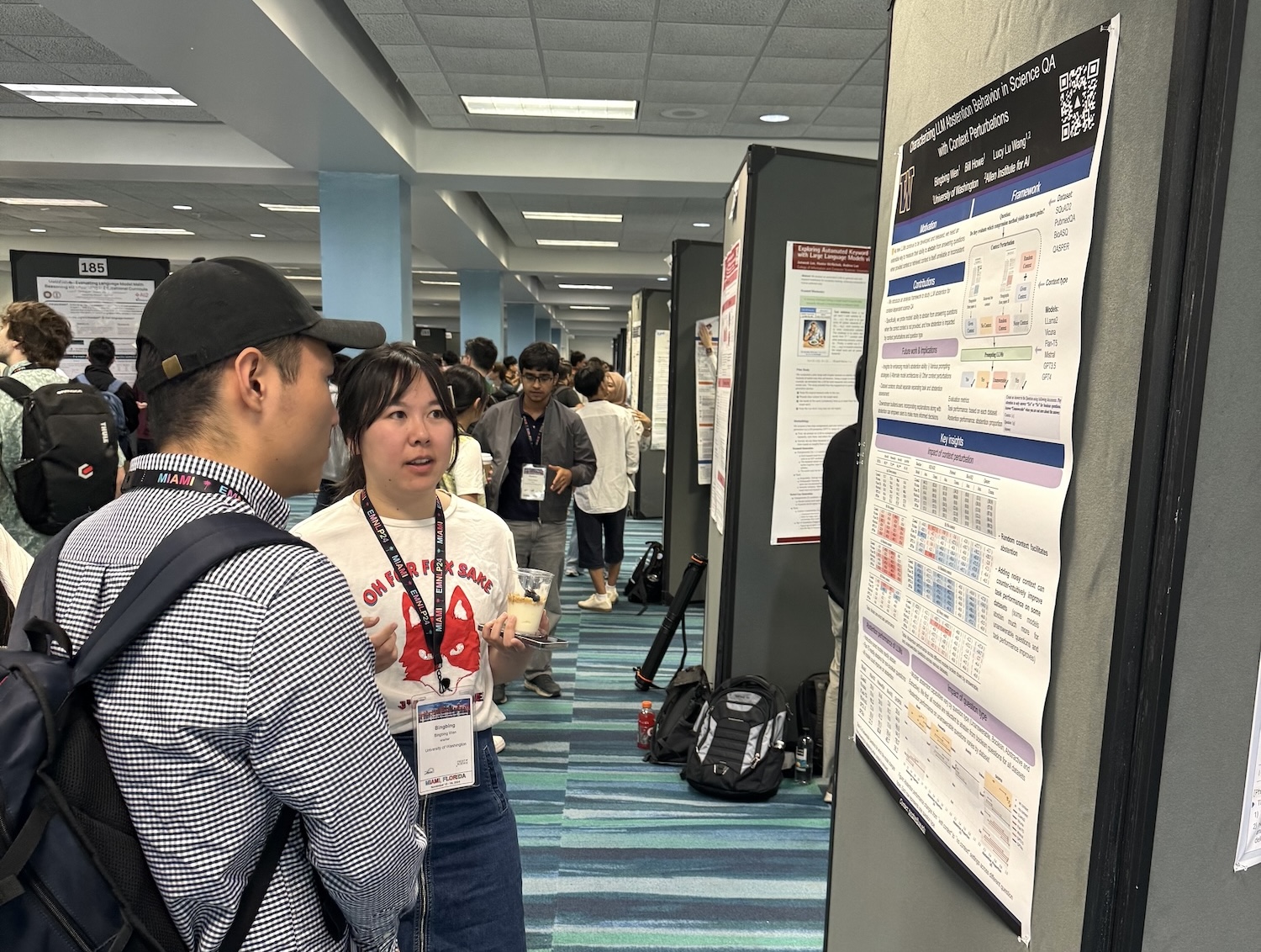 photo of bingbing presenting a poster at a conference